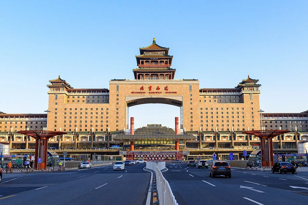 The front of Beijing West Railway Station under a clear blue sky